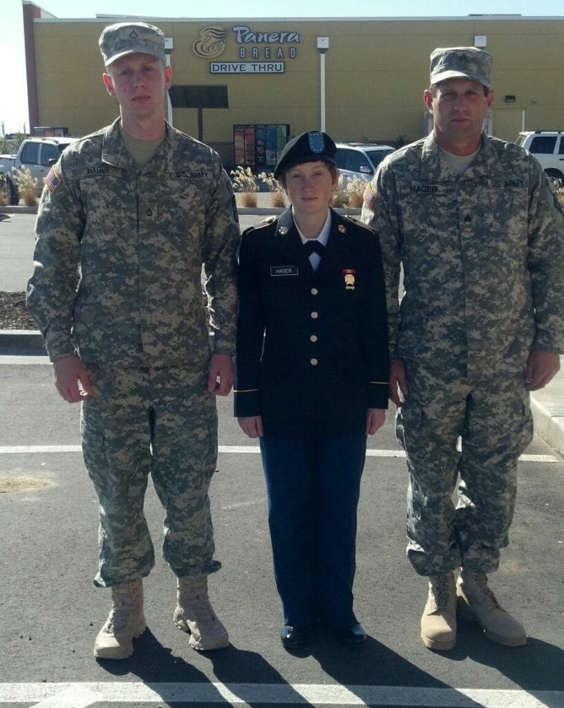 Tyler Hager (middle) alongside his brother and father./Courtesy Tyler Hager