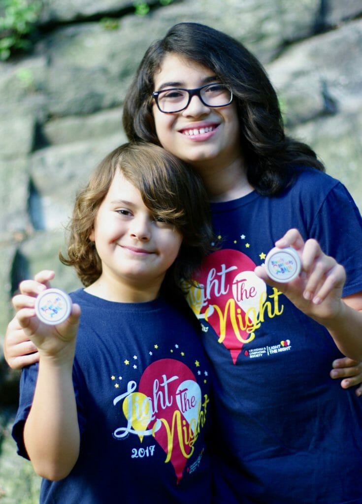 Heath (left) and Harry (right) proudly holding their namesake Bennett Brothers Balm./ Bennett Brothers Balm