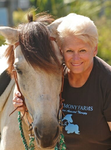 Pam Rogan and therapy horse, “Blondie.”/Courtesy Pam Rogan
