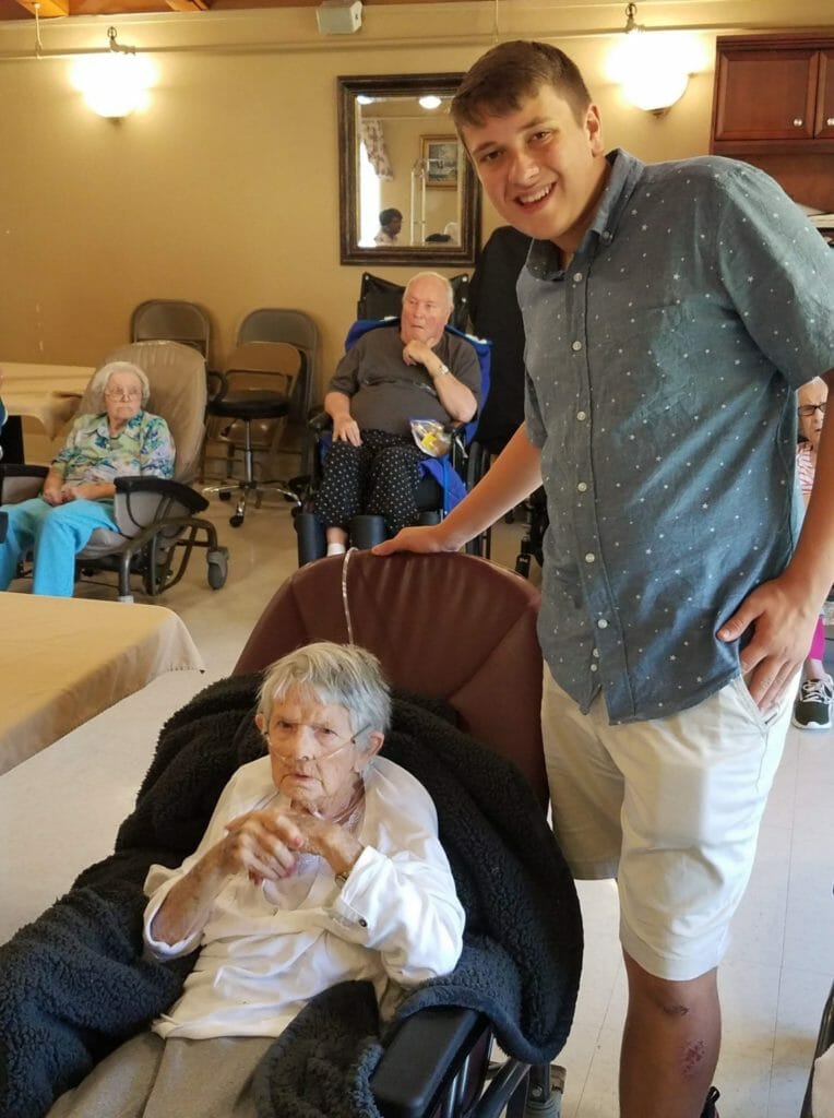 Ben Trofemuk (right) with a nursing home resident./ Courtesy Ben Trofemuk 