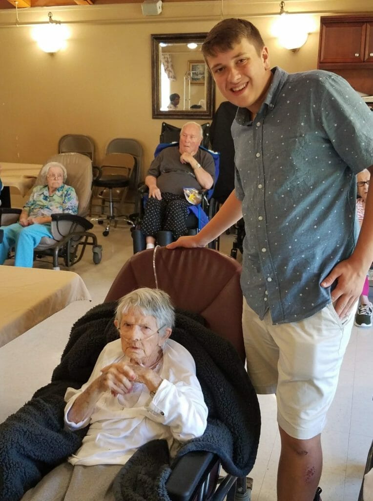 Ben Trofemuk (right) with a nursing home resident./ Courtesy Ben Trofemuk