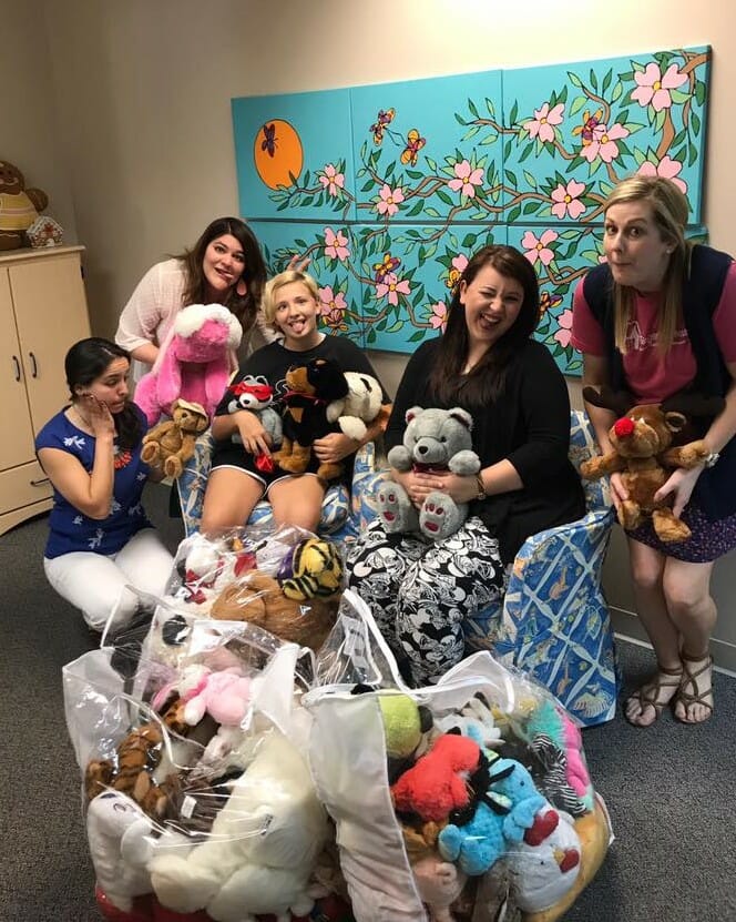 Julianna (3rd from left) delivering 100 stuffed animals to the Gingerbread House on October 9th, 2017. /Courtesy Julianna Gouthiere