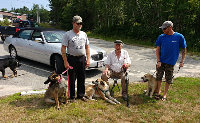 Salute of Service teams arrive at a weekly training event in their community. 