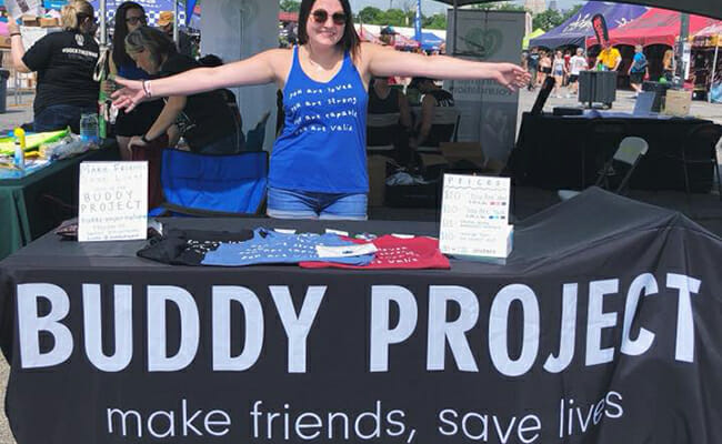 Gabby Frost represents Buddy Project in the Nonprofit Village section of the Warped Tour in Philadelphia.