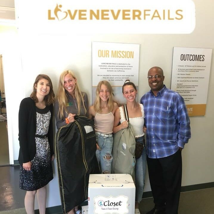 Carly Glasson (second from left)  with volunteers and staff from Love Never Fails, a non-profit that works with victims of human trafficking./Courtesy 1Closet