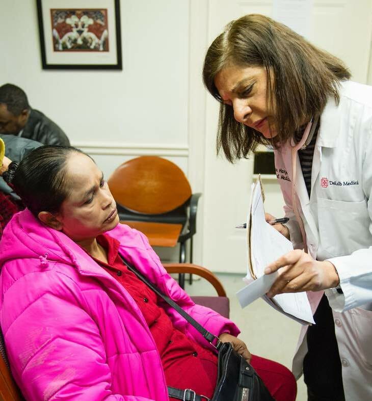 Dr. Harjee (right) with patient Zahayda Sulaiman./Courtesy Bita Honarvar (AJC) 