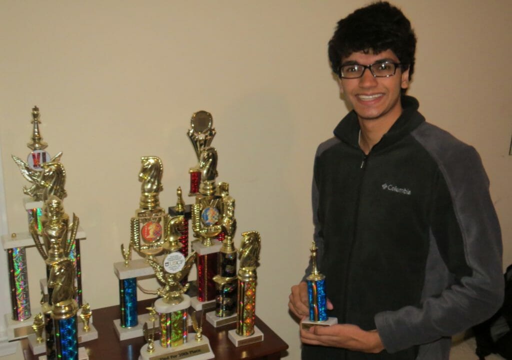 Srikar Karra with some of the trophies he as accumulated from various chess tournaments./ courtesy Srikar Karra