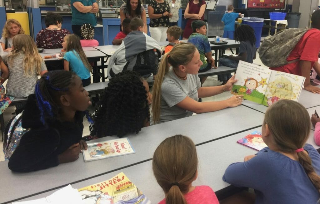 Sami pictured reading to children as part of the Summer Soar Reading Program from summer 2018. / Courtesy Sami Meyer