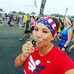 Marisa crosses the finish line at the annual Army Ten-Miler in Washington, D.C.