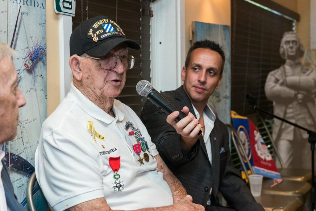 Paton interviews one of the veterans involved with Honor Flight South Florida, which seeks to honor veterans of World War II, Korea and Vietnam. /Courtesy Ryan Paton