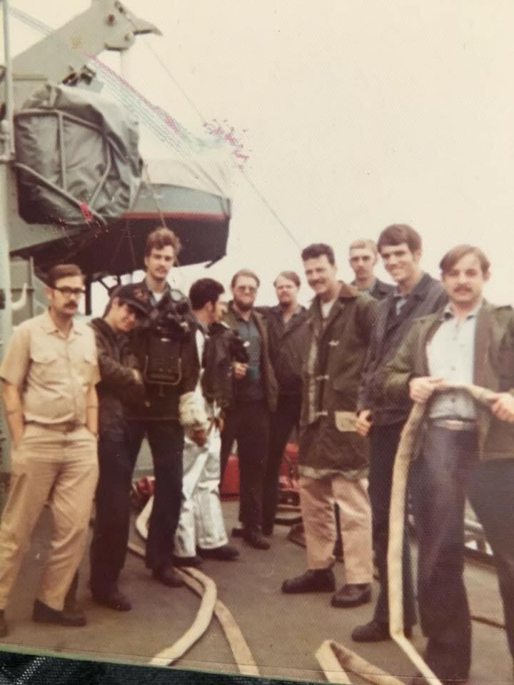 William, second from left, stands with the Crash Detail USS Hoel in 1974. William served in the Navy for over 20 years./ Courtesy William Romer