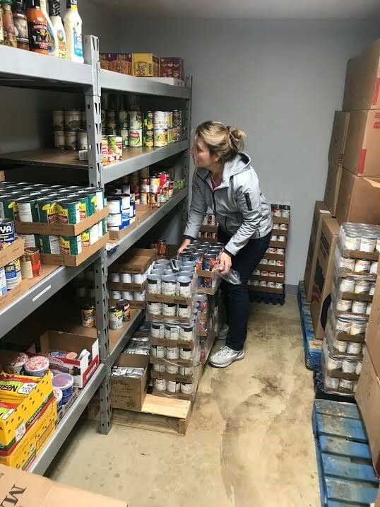 Renee goes to the MCPAL food pantry at least twice a week to help unpack and sort items to be distributed weekly to 21 families in the area./Courtesy Renee Haberfield
