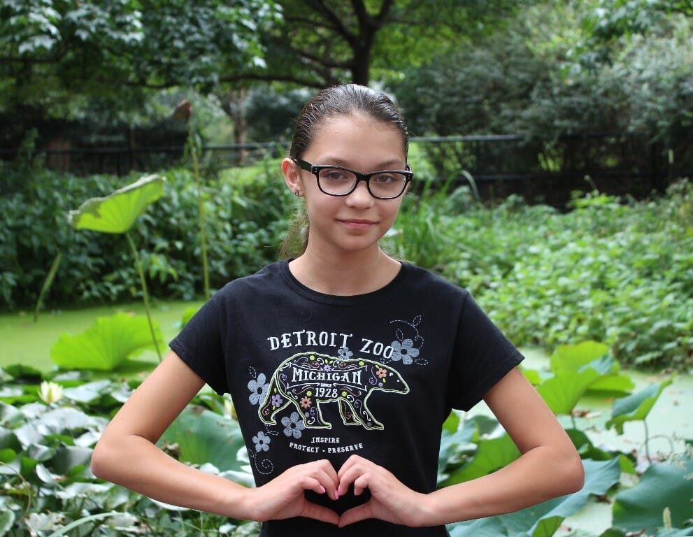 TrinityFavazza wearing her Detroit Zoo shirt at the wetlands in the National Zoo./ Courtesy Angel Favazza