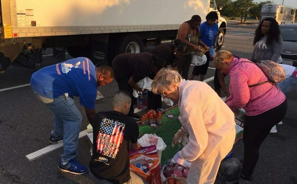 Antione (far left) says he reaches about 15 to 20 homeless veterans each weekend, providing them with snacks, toiletries and support./Courtesy Antione Hines