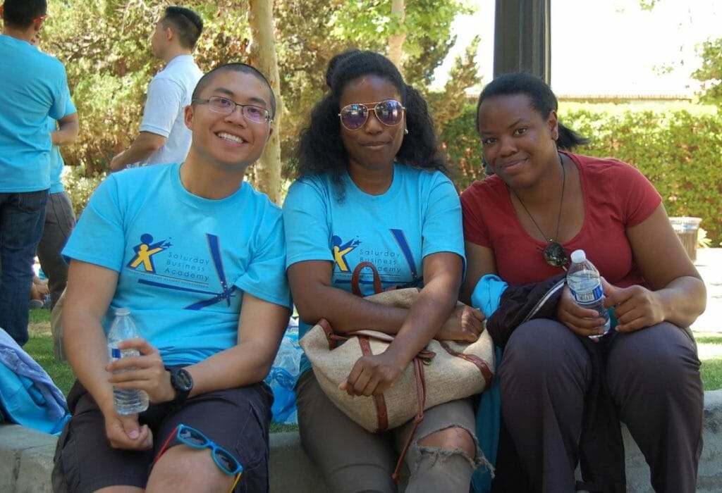 Pascal Su (far left) has volunteered with the Saturday Business Academy for four years./ Courtesy Pascal Su 