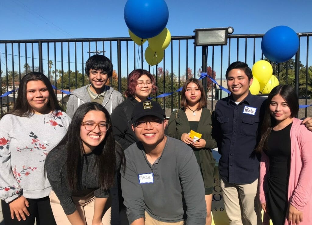 Pascal Su (fourth from right) with several students from the Saturday Business Academy./ Courtesy Pascal Su