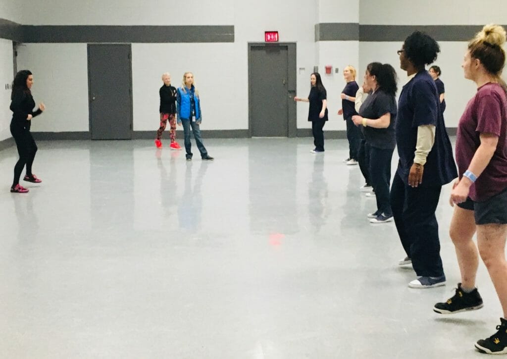 Kristy Mowry, Lake County YMCA-East End instructors and Healthy Living Directors, Lana and Janie, pictured during a Lake County jail cardio class, along with female inmates/ Courtesy Kristy Mowry