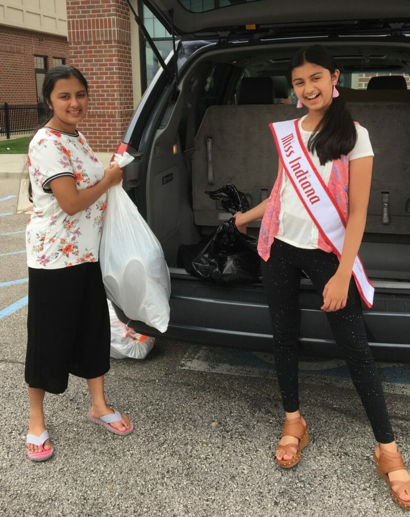  Anitha (left) and Vani (right) collect gently-used shoes for Changing Footprints./Courtesy Smitha Sharma