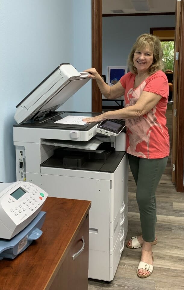 Mary volunteering in the office at Hospice of Kona./Courtesy Mary Hamacher