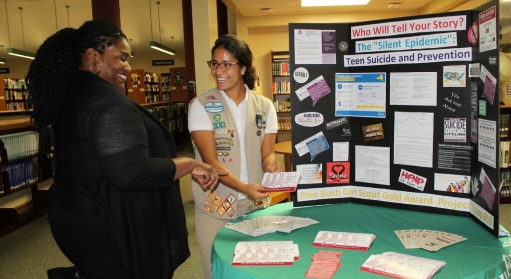 Isabella Sapio works an education booth at  her local high school./ Courtesy Isabella Sapio
