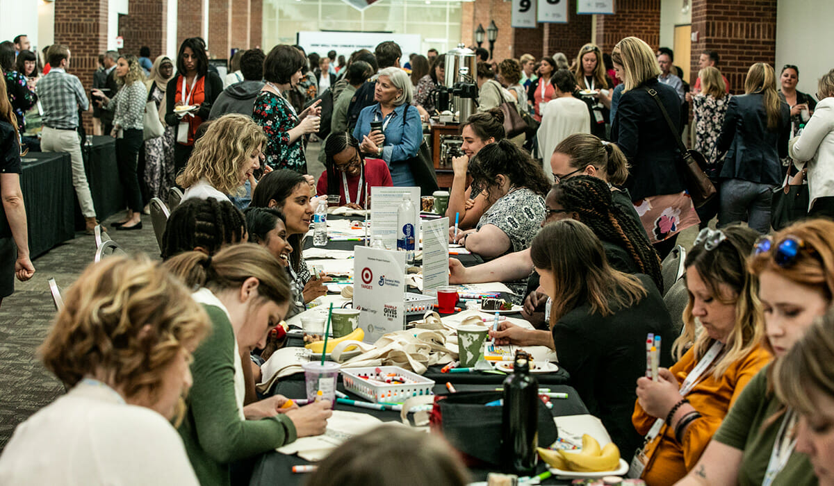 Attendees gather at the Points of Light Conference for forums, activities and civic talks. 