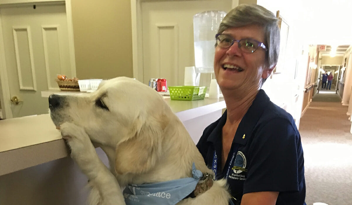 Jean Dombi, Kyra Carbone & Seth Comfort Dog Daily Point of Light Award Honoree