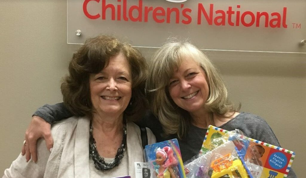 Daily Point of Light Award Honoree Kristen Weinberg, right, and her mother deliver toy’s to a children’s hospital in Washington, D.C. as part of her What’s Your 50? movement.