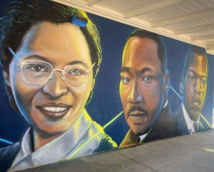 A mural of famous Black individuals.
