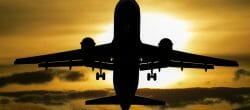 silhouette of front of airplane in flight