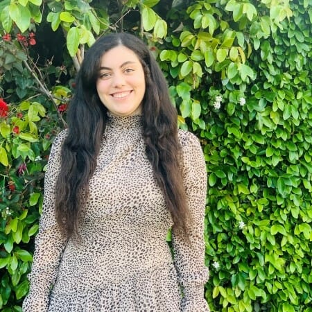 Person in a leopard print dress.